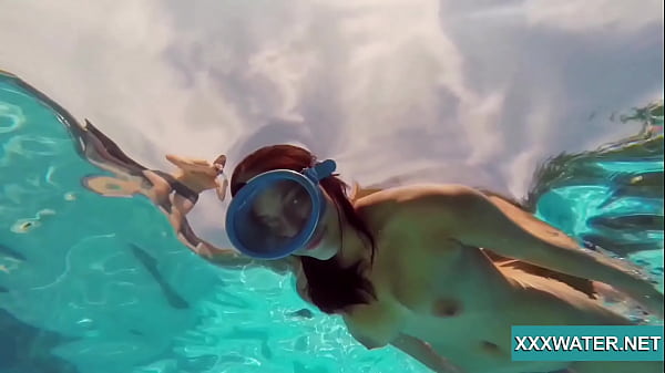 Hot brunette slut Candy swims underwater