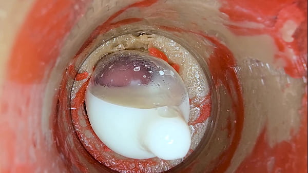 The camera 4k inside the deep pussy records a huge ejaculation with a stuck condom