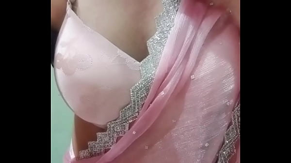 Indian Gay Crossdresser Bottom Gaurisissy Pressing and Playing with Her Big Boobs in Pink Saree with jwellery Looking Like a Housewife