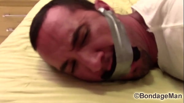 Victor SockGagged and TapeGagged tight and captured with socks inside his mouth wrapped the tape around his head PREVIEW