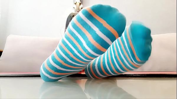 Do you like to smell worn socks? Luxurious Dominatrix in lingerie will give you the opportunity to smell her socks. When she takes off her socks, she will put them in your mouth like a gag.